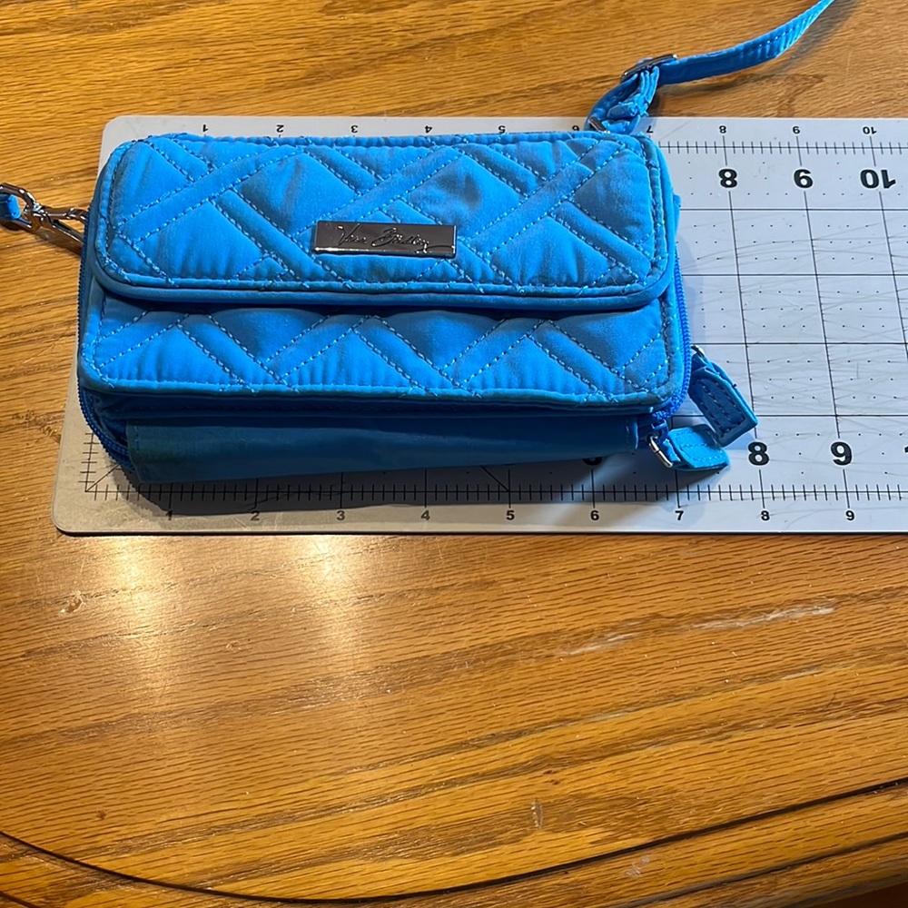 Blue preowned Vera Bradley wallet.